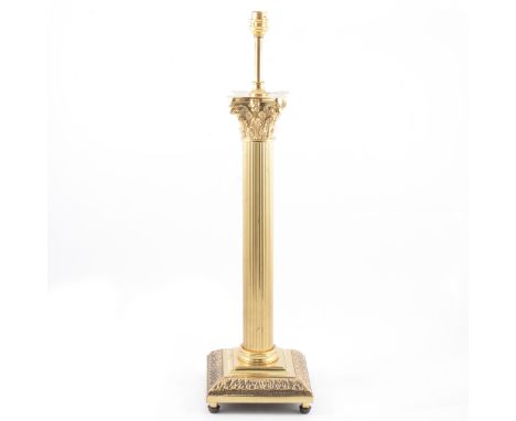 Brass table lamp, Corinthian column, 65cm, with a pleated shade.