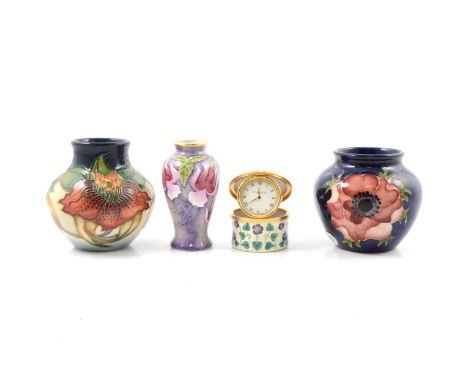 A Moorcroft pottery bulbous vase, Anna Lily, dated '98, 8cm; another vase, Anemone, 7.5cm; an enamel miniature vase, Fuchsia,