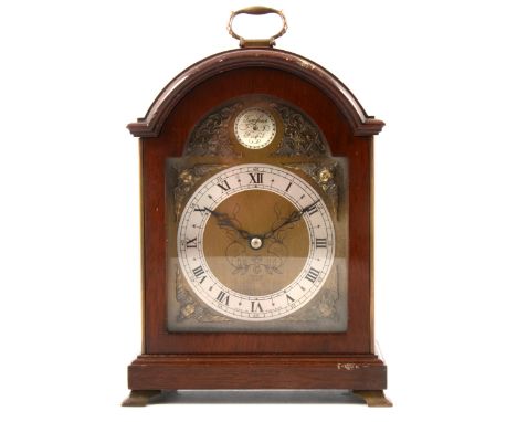 Elliott walnut mantel clock, domed case, 24cm, and a George III style mahogany stick barometer, silvered dial, 96cm.