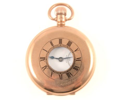 9 carat yellow gold yellow gold demi hunter pocket watch, 40mm white enamel dial with a roman numeral chapter ring with subsi