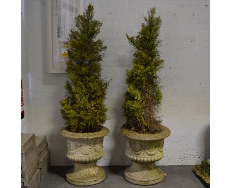Large pair of reconstituted stone garden urns, ribbon and swag design, fluted pedestal bases, diam 64cm, height 64cm.