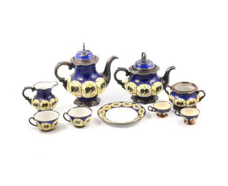 A Hutschenreuther German porcelain teaset, comprising teapot (20cm), hot water pot, cups, saucers, milk jug and twin-handled 