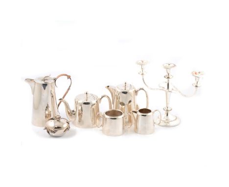 A Sheffield silver-plated four-piece Hotel Ware teaset; plated candelabra; meat platter; cutlery; and other plated wares.