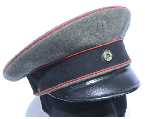 Imperial German WWI officers visor cap, together with sweetheart brooch. P&amp;P Group 2 (£18+VAT for the first lot and £3+VA