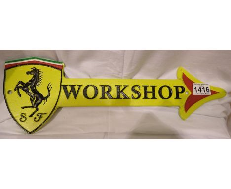 Cast iron Ferrari workshop arrow, W: 45 cm. P&amp;P Group 2 (£18+VAT for the first lot and £3+VAT for subsequent lots) 