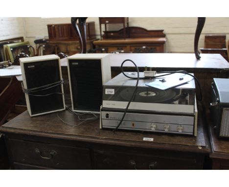 A vintage record player by Fidelity 'UA4', and two speakers, (sold as collector's item and not electrically tested)