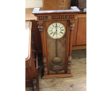 A mid 20th Century carved walnut wall clock, door height approx. 76.5cm