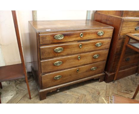 A George III mahogany caddy top four drawer chest, on offset bracket feet