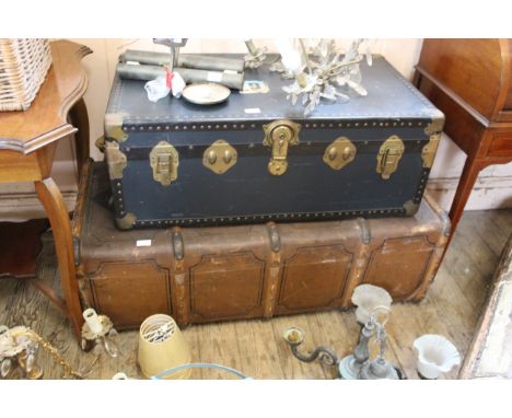 A vintage canvas and wood clad steamer trunk, and one other with metal corners etc