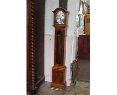 A 20th Century small longcase style clock in a yew and walnut case, brass dial