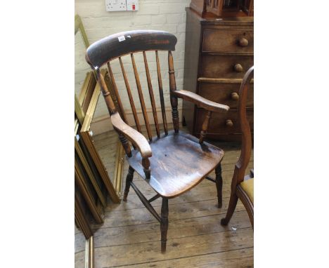 A late 19th Century beech and elm stick back armchair