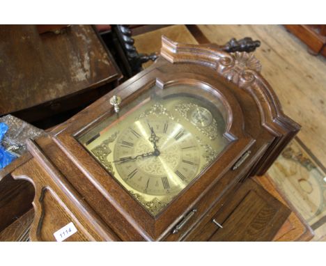 A mid 20th Century oak cased wall clock marked 'Temp Fugit'