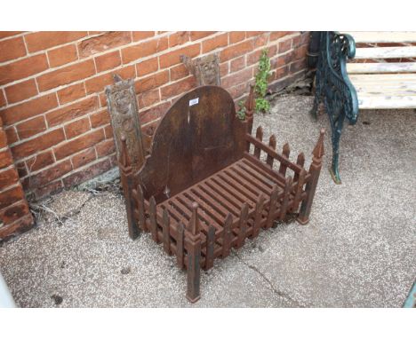 An early 20th Century fire grate approx. depth 38.5cm x width 60cm