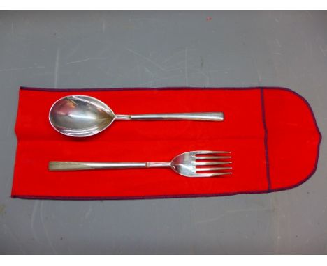 A 925 silver spoon and fork set. 