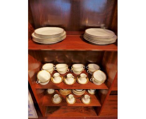 A Rosenthal part tea service with gilt border. 