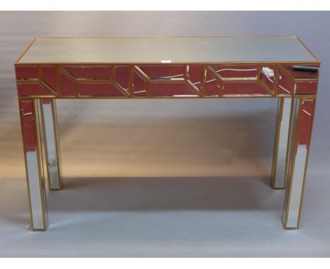 An Art Deco style mirrored console table with bevelled finish. H-79cm, W-122cm, D-42cm 