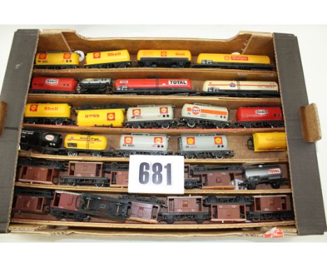 Unboxed OO/HO Gauge Freight stock by various makers: A tray containing Various Tank Wagons and Brake Vans by Hornby and Lima,