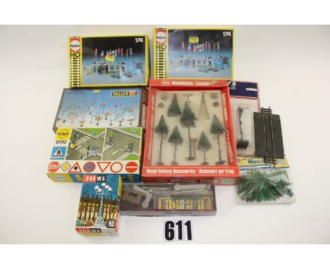 HO scale scenic accessories by various makers: including road sign/street furniture sets by Herpa (2), Kibri and Faller, a Br