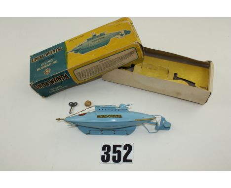 A  Sutcliffe Unda-Wunda Tinplate clockwork Diving Submarine, in light blue with key and cork, in original box, G, small area 