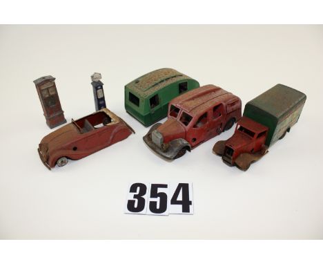 Distressed pre-war  Tri-ang Minic Vehicles:  Caravan two tone green, rust to roof), Carter Paterson Van, rust to upper surfac