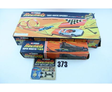 Corgi Rockets:  Cori Rockets 2058 Race Abatic Speed Set, 1970 Super Booster, in original boxes and 1933 Pit-Stop Kit, in orig