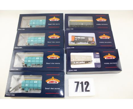 OO Gauge freight wagons by Bachmann: comprising four 33-430 POA scrap wagons in Turquoise SR colours, together with Box Vans 