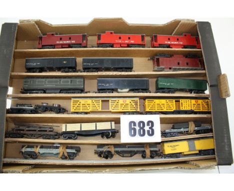 Unboxed OO/HO Gauge Freight stock by various makers: A tray containing various Stock cars, track cleaners, cabooses, (Triang 