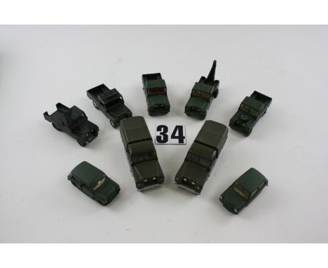 Tri-ang Spot-0n and  Corgi repainted Army green Land Rovers and Minis:  Spot-On  models with plastic tilts (additional holes 