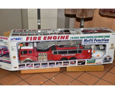 A HOBBY ENGINE FIRE ENGINE, 1:18 scale radio control, shoots water and sounds a siren, boxed with remote control and recharge