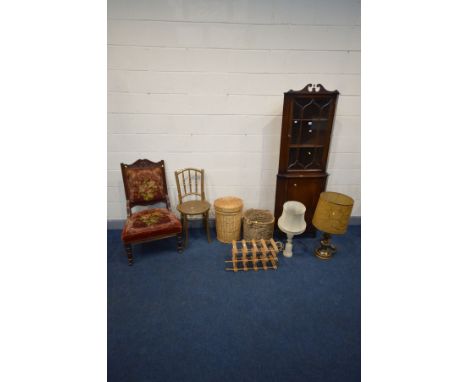 AN EDWARDIAN WALNUT PARLOUR CHAIR, a mahogany corner cupboard, gilt painted bentwood chair, two wicker baskets, two table lam