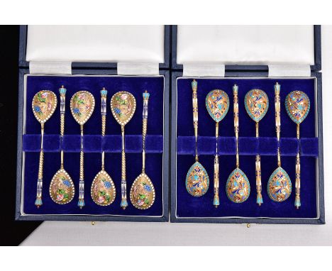 TWO CASED SETS OF SIX RUSSIAN SILVER GILT TEASPOONS, late 19th/early 20th Century in later cases, the spoons with cloisonne s