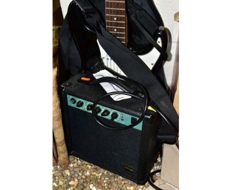 A STAGG ELECTRIC GUITAR AND AMPLIFIER, with instructions and a soft carry case, no cable to connect together