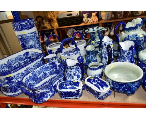 A QUANTITY OF MODERN BLUE AND WHITE CERAMICS, to include a wash bowl and jug, three watering cans, foot baths, stick stand, w