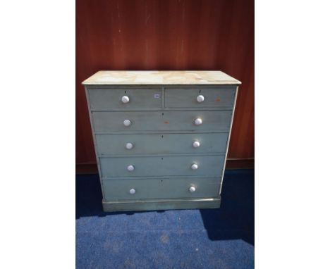 A VICTORIAN GREEN PAINTED PINE CHEST OF TWO SHORT OVER FOUR LONG DRAWERS, with ceramic handles, width 114cm x depth 54cm x he