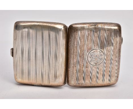 A SILVER CIGARETTE CASE, of a rounded rectangular form, engine turned design with an engraved monogram, push button clasp, in