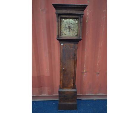 A GEORGIAN OAK LONGCASE CLOCK, the square hood enclosing a brass dial, with cherub spandrels, Arabic and Roman numerals, surr