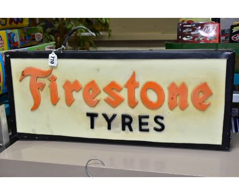 A REPRODUCTION PLASTIC FIRESTONE TYRES LIGHT BOX ADVERTISING SIGN, orange and black lettering on a cream ground, some cabling