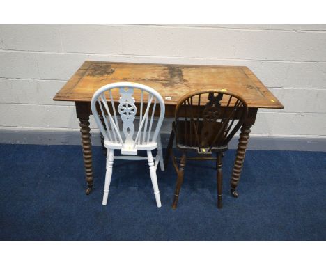 A VICTORIAN OAK TABLE, with a later top, missing inlay top, the base with two drawers at each end with campaign handles, on b