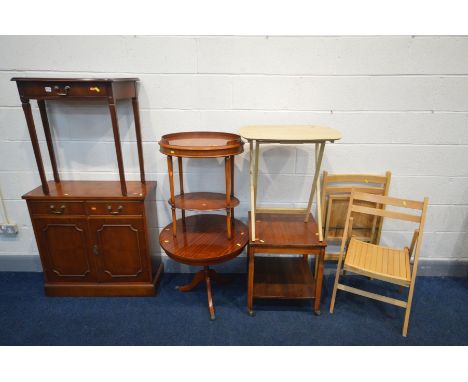 A SELECTION OF OCCASIONAL FURNITURE, to include a yew wood two door tape cabinet (key) mahogany hall table, a Bradley yew woo