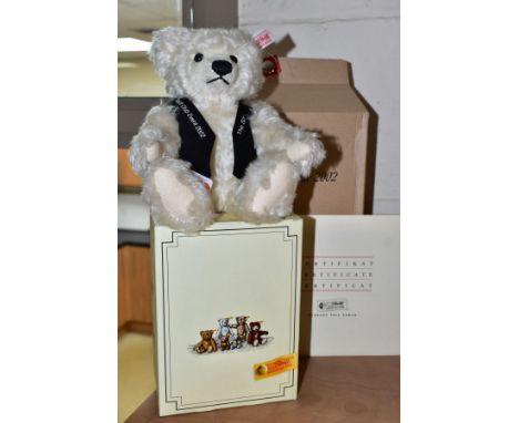 A BOXED STEIFF LIMITED EDITION CLUB EVENT TEDDY BEAR 2002, white blonde mohair, fully jointed, wearing a waistcoat, height 21