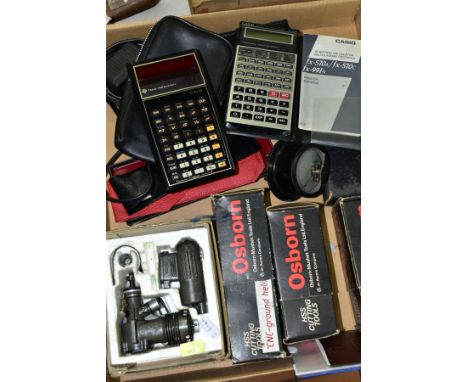 A BOX OF TOOLS, CALCULATORS AND MATHEMATICAL EQUIPMENT, to include Osborn HSS cutting tools, vintage ammeter Rockwell, Casio 