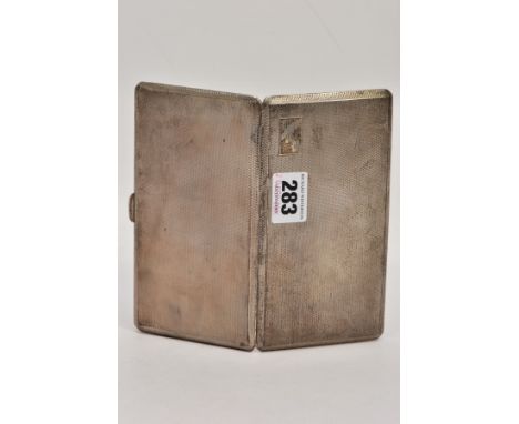 A SILVER CIGARETTE CASE, with engine turned decoration and rectangular cartouche to one corner with engraved initial monogram