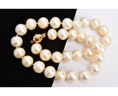 A CULTURED PEARL NECKLACE WITH 18CT GOLD CLASP, designed as a single row necklace, pearls measuring approximately 12mm to 14m