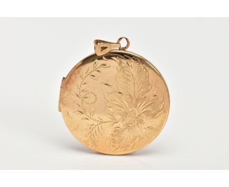 A 9CT GOLD LOCKET, of a circular form, engraved floral and foliate design to both sides, opens to reveal two photo compartmen