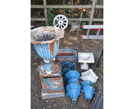 AN EARLY 20TH CENTURY CAST IRON URN ON A DISTRESSED STAND diameter 45cm x height 104cm, six blue painted hoppers and a white 