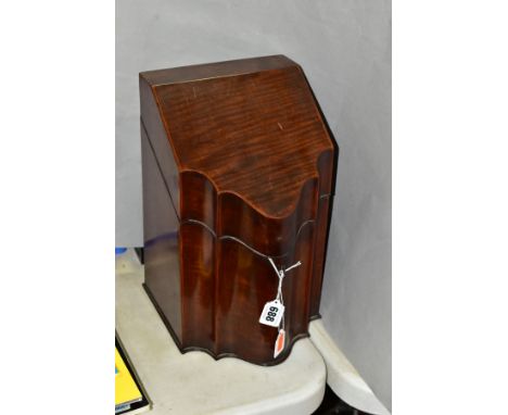 A GEORGE III STYLE MAHOGANY SERPENTINE FRONTED KNIFE BOX SHAPED TEA CADDY, the hinged lid inlaid to the interior with a star 