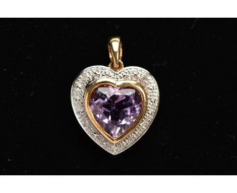 A 9CT GOLD AMETHYST AND DIAMOND HEART PENDANT, designed with a heart shape amethyst, within a single cut diamond detailed sur