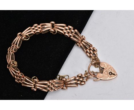 A 9CT ROSE GOLD GATE BRACELET, a three-bar variable link bracelet, fitted to an engraved padlock, measuring approximately 180