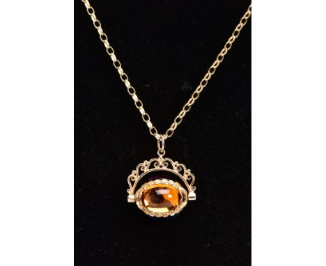 A 9CT GOLD SWIVEL FOB PENDANT NECKLACE, the swivel fob set with a yellow, blue and purple paste cabochon, openwork scroll bra