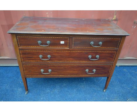 AN EDWARDIAN MAHOGANY AND STRUNG CHEST OF TWO OVER TWO LONG DRAWERS, width 106cm x depth 46cm x height 80cm (the item in this